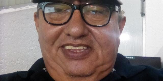 Mario Zapata sonriente, foto con buena definición