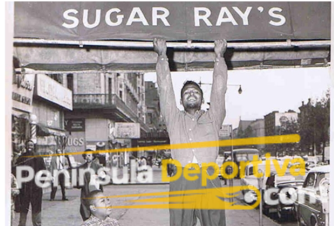 Ray Robinson jugando en su negocio con marca de agua