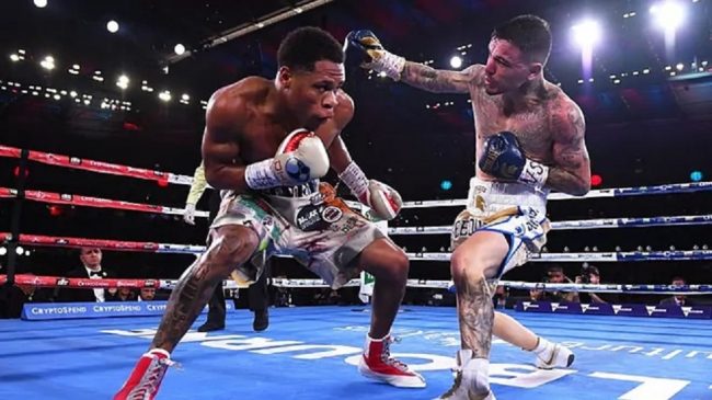 Devin Haney vs. George Kambosos gdu 12 retuvo cetro mundial ligero CMB, ganó el de la OMB, FIB, AMB, 1 del 050622 en Melbourne y se volvió campeón unificado