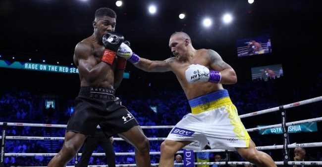 Oleksandr Usyk vs. Anthony Joshua gdm 12 retuvo campeonatos completo AMB. FIB y OMB, del 200822 en Jeddah, Arabia Saudita