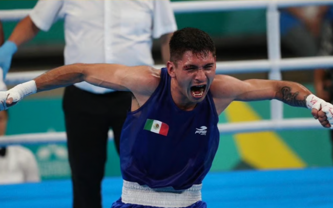 Miguel Ángel Piolín Martínez vencedor de Alexy Miguel de la Cruz Báez semifinal Juegos Panamericanos 63.5 kilos, ganó 3-2, del 261023 en Santiago, calificó a Paris 2024 y pasó a final