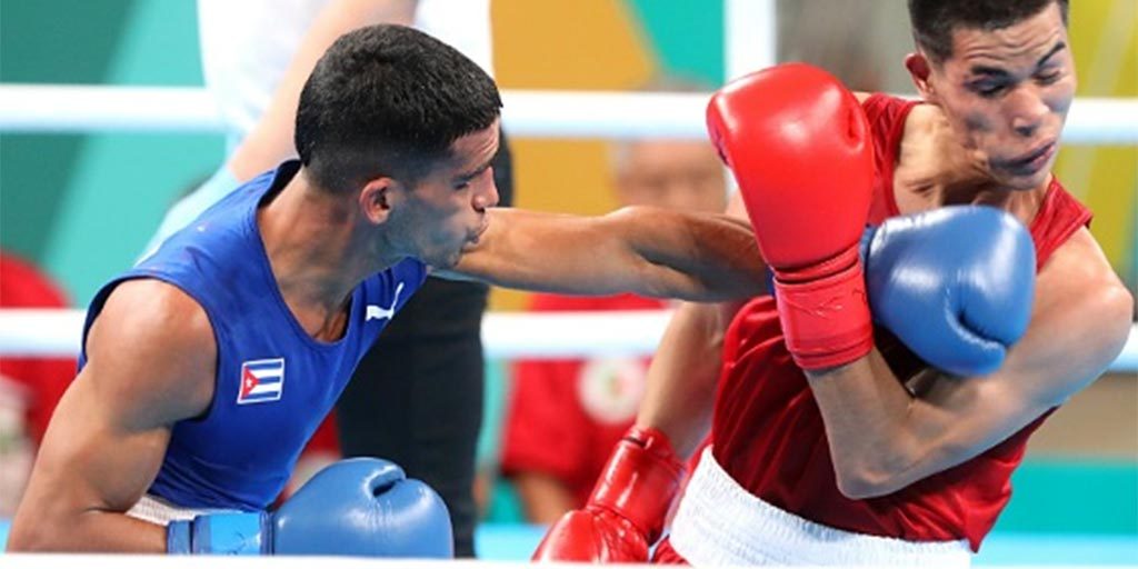 Saidel Horta de Cuba vs. Miguel Vega de México, debut de ambos en Juegos Panamericanos, peso pluma, gd del 191023 en Santiago