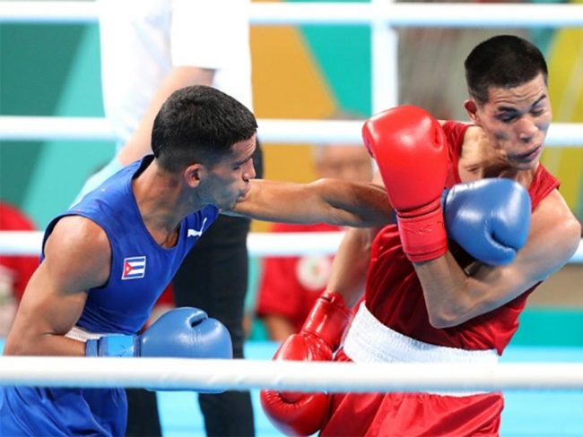 Saidel Horta de Cuba vs. Miguel Vega de México, debut de ambos en Juegos Panamericanos, peso pluma, gd del 191023 en Santiago
